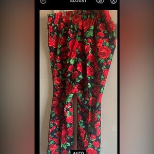Brand new Black trousers with red roses. Material is soft and comfortable.